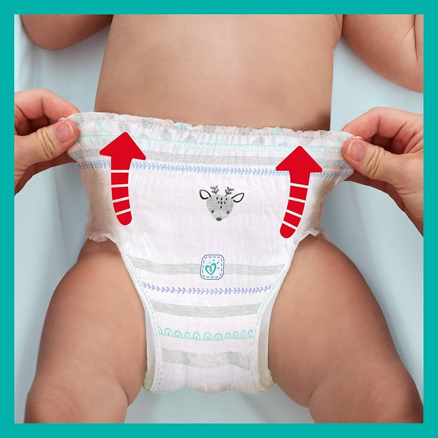 zakladanie pieluchy pampers